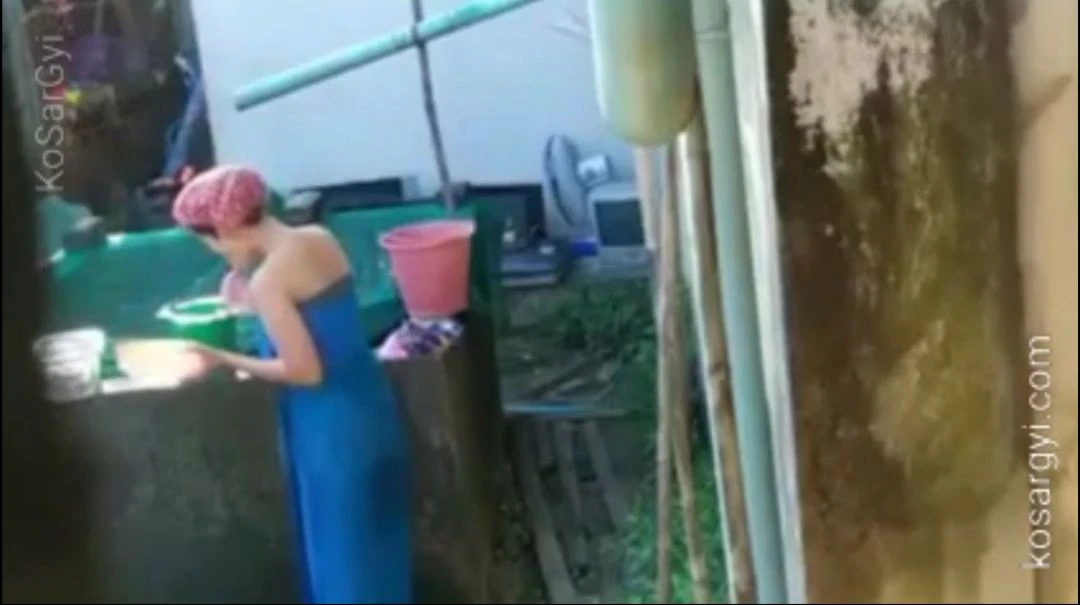 ရေချိုးချောင်းရိုက် (၃၄) – A lady wash clothes and take a shower